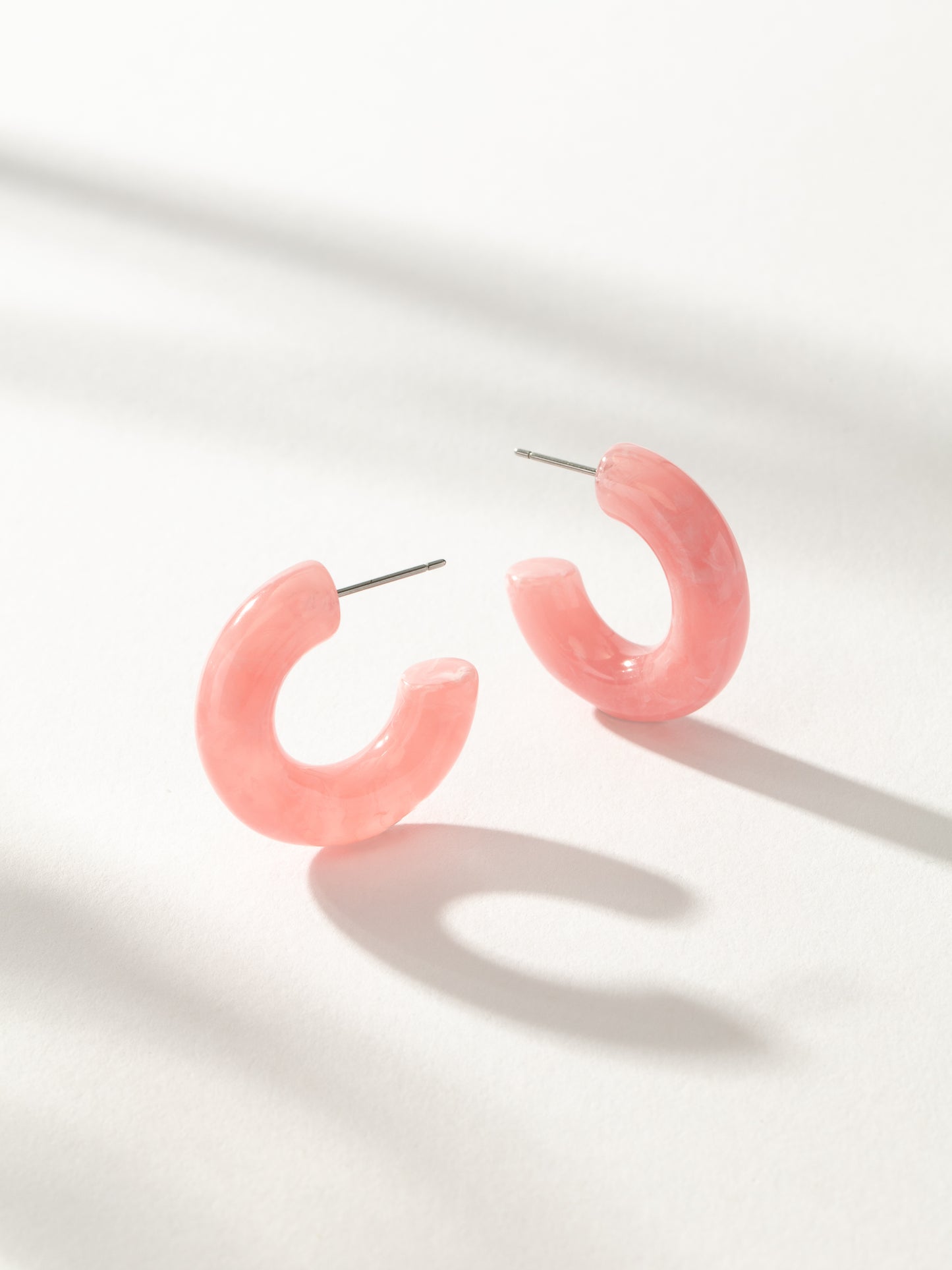 Tube Hoop Earrings | Resin Marbled Pink | Product Image | Uncommon James