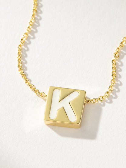 ["Bold Letter Necklace ", " Gold K ", " Product Detail Image ", " Uncommon James"]