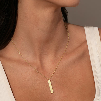 ["Vertical Bar Necklace ", " Gold ", " Model Image ", " Uncommon James"]