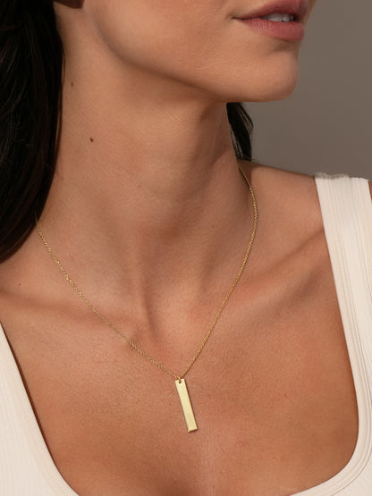["Vertical Bar Necklace ", " Gold ", " Model Image ", " Uncommon James"]