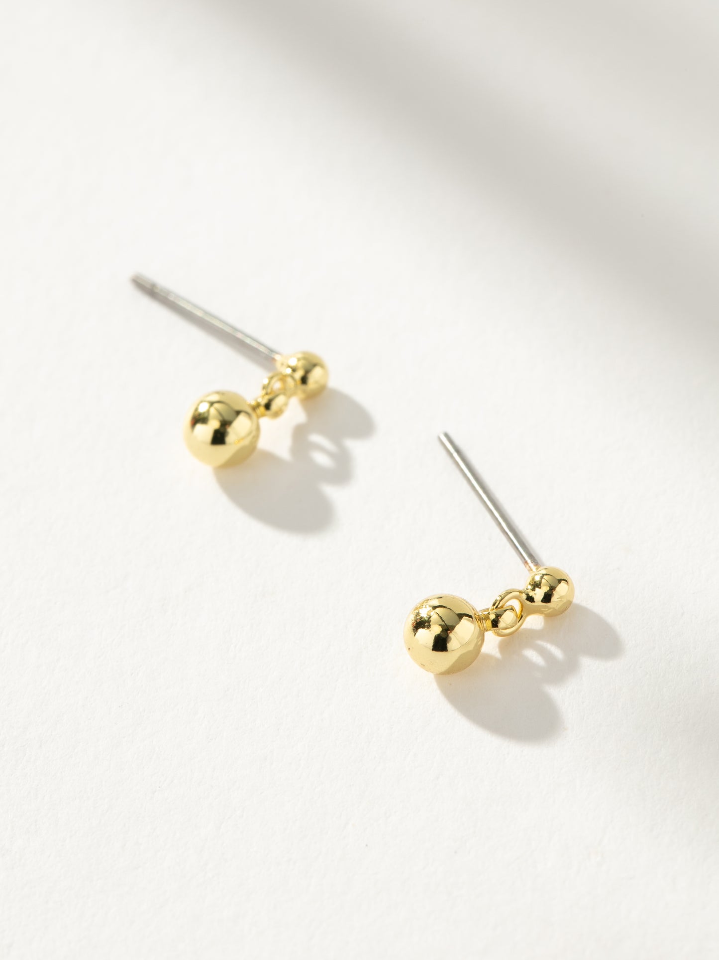 Move On Stud Earrings | Gold | Product Image | Uncommon James