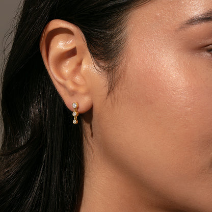Scandal Earrings | Gold | Model Image | Uncommon James