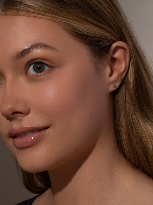 Ball Flat Back Earring | Sterling Silver | Model Image | Uncommon James