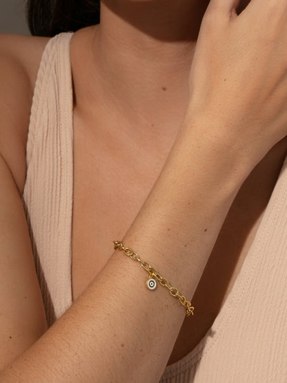 ["Simple Evil Eye Bracelet ", " Gold ", " Model Image ", " Uncommon James"]