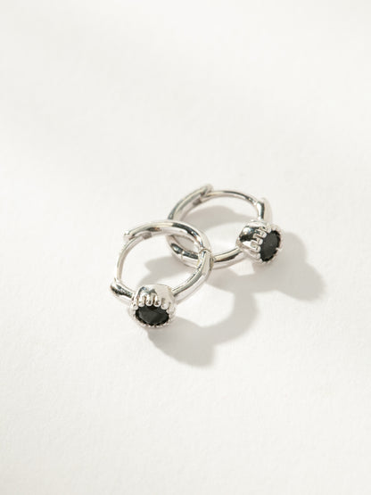 ["Center Stage Huggie Earrings ", " Sterling Silver Black", " Product Detail Image ", " Uncommon James"]