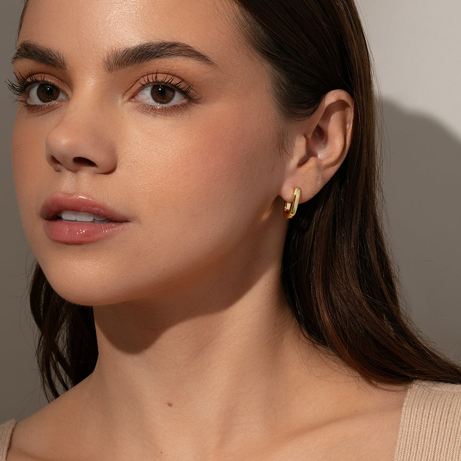 Oval Huggie Earrings | Gold | Model Image | Uncommon James
