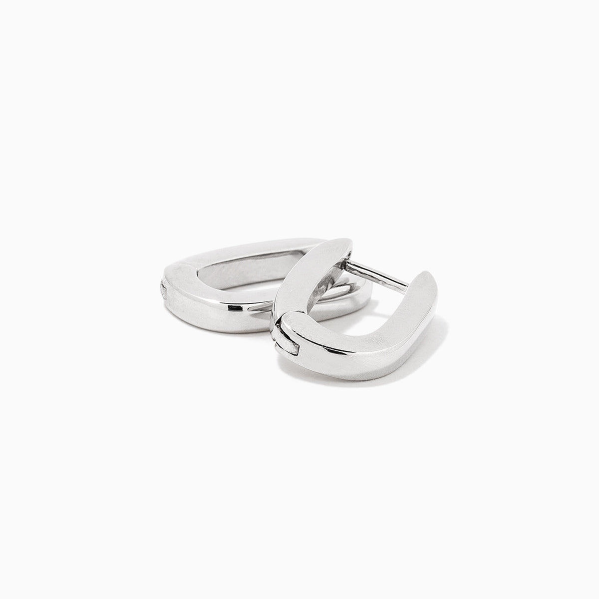 Oval Huggie Earrings | Silver | Product Detail Image | Uncommon James