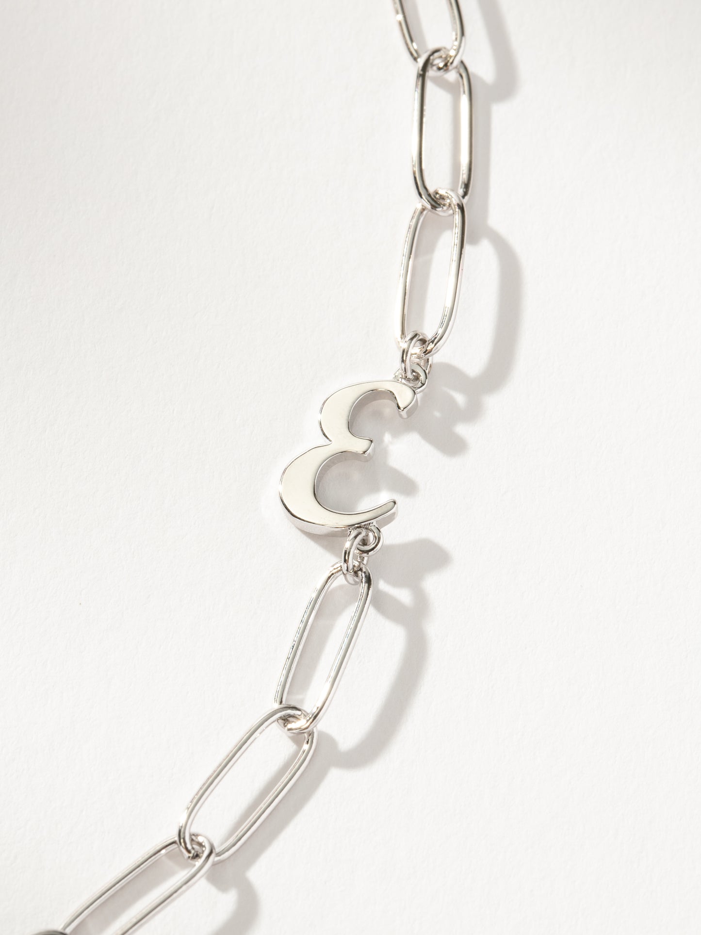 Cursive Initial Necklace | Silver E | Product Detail Image | Uncommon James