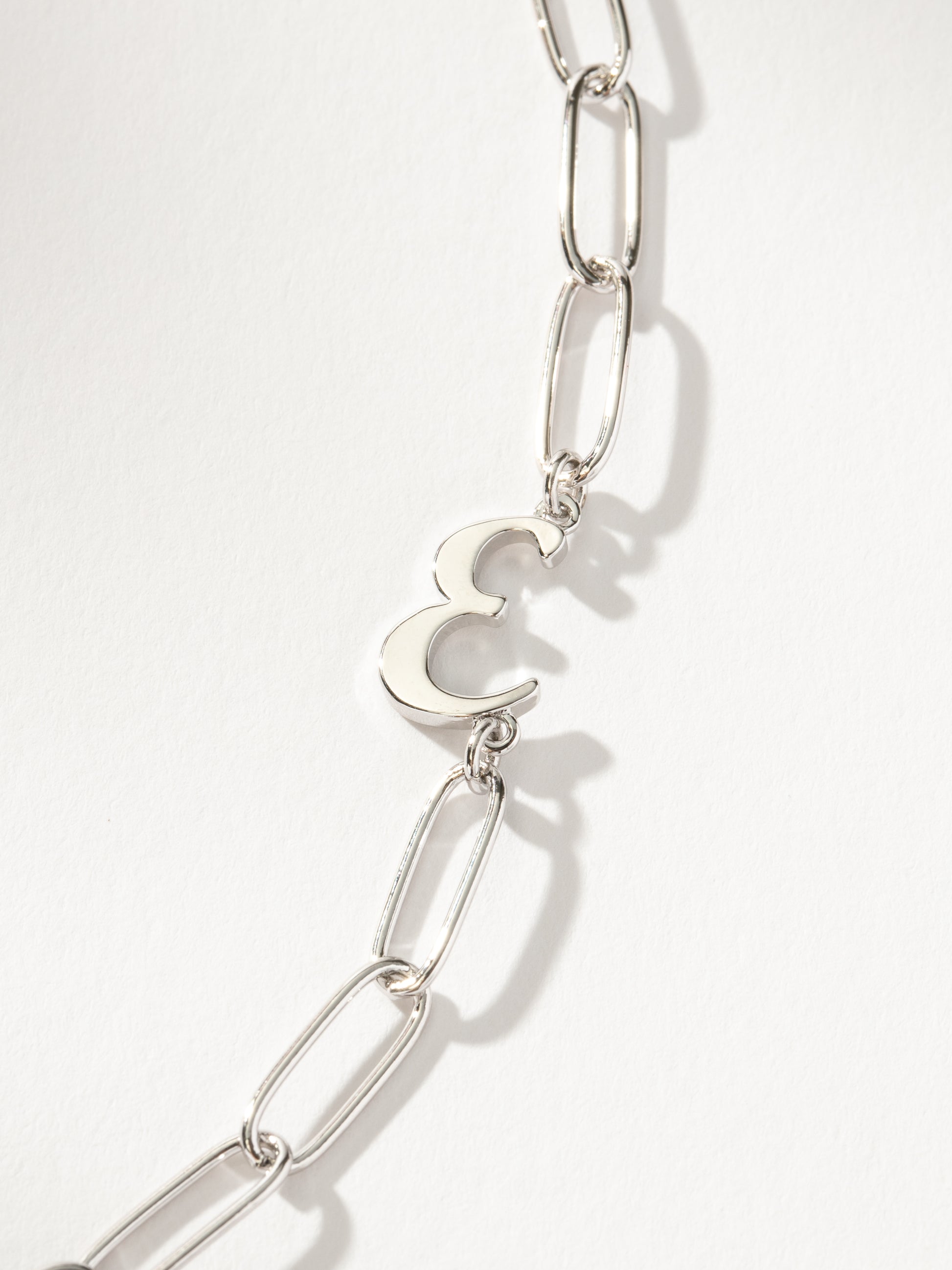 Cursive Initial Necklace | Silver E | Product Detail Image | Uncommon James