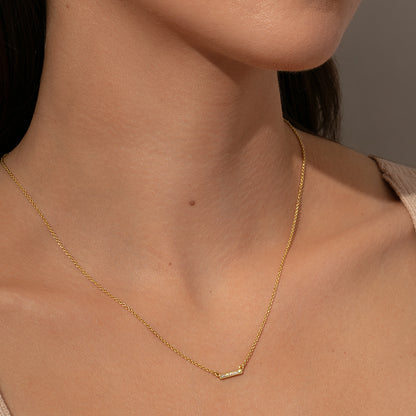 ["Ray of Light Bar Necklace ", " Gold ", " Model Image 2 ", " Uncommon James"]