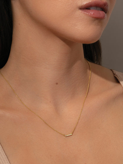 ["Ray of Light Bar Necklace ", " Gold ", " Model Image ", " Uncommon James"]