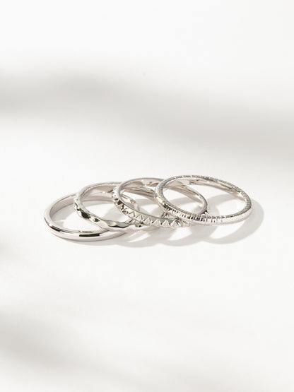 ["Textured Ring Stack (Set of 4) ", " Silver ", " Product Image ", " Uncommon James"]