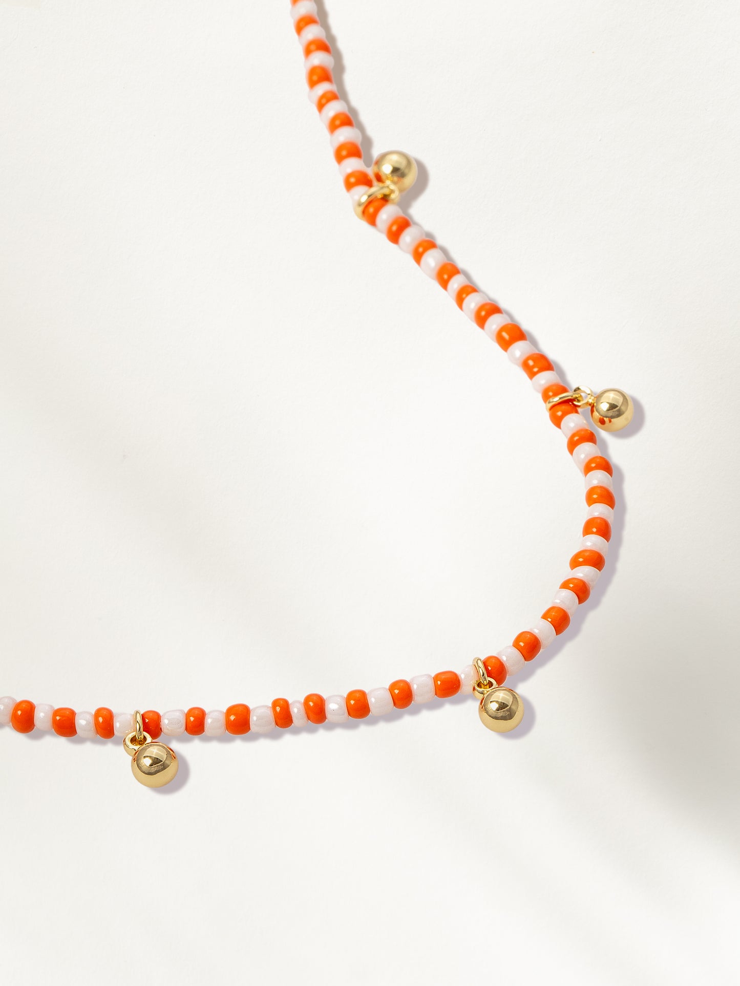 Sunset Beaded Bracelet | Gold Orange/White | Product Detail Image | Uncommon James