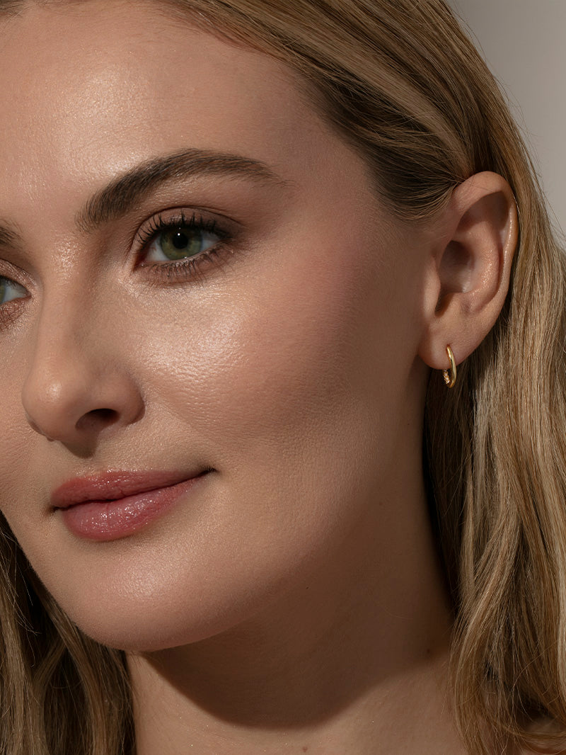 Hidden Pavé Stud Earrings | Gold | Model Image | Uncommon James