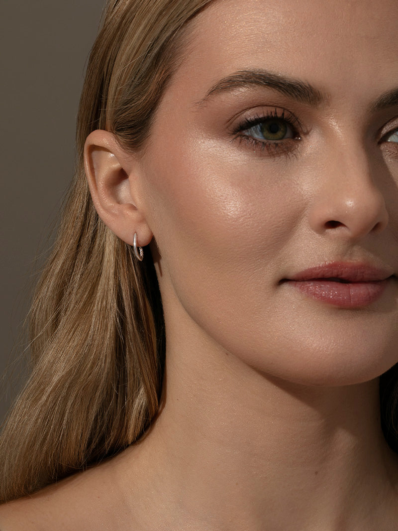 Hidden Pavé Stud Earrings | Silver | Model Image 2 | Uncommon James