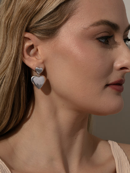 ["Love Language Statement Earrings ", " Silver ", " Model Image ", " Uncommon James"]