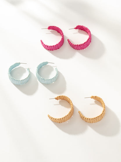 ["Raffia Woven Hoop Earrings ", " Blue Nude Magenta ", " Group Image ", " Uncommon James"]