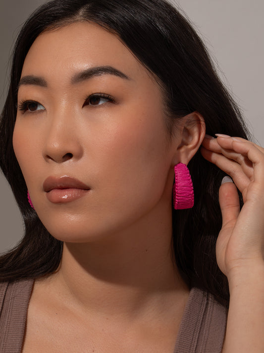 Raffia Woven Hoop Earrings | Magenta | Model Image | Uncommon James