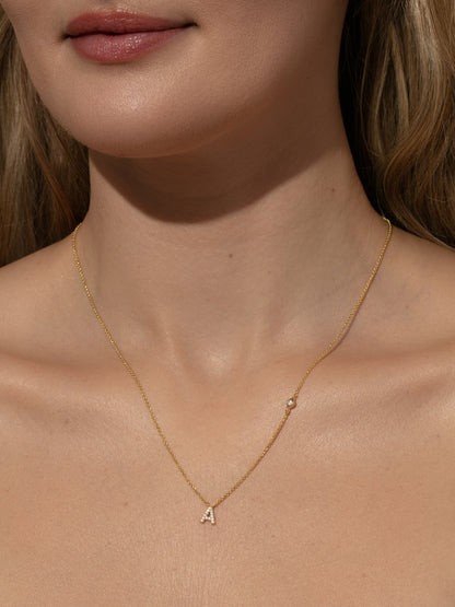 ["Pavé Initial Necklace ", " Gold ", " Model Image ", " Uncommon James"]