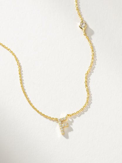["Pavé Initial Necklace ", " Gold F ", " Product Detail Image ", " Uncommon James"]