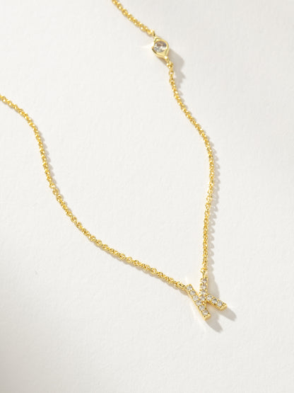 ["Pavé Initial Necklace ", " Gold K ", " Product Detail Image ", " Uncommon James"]