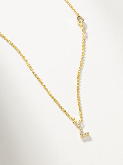["Pavé Initial Necklace ", " Gold L ", " Product Detail Image ", " Uncommon James"]
