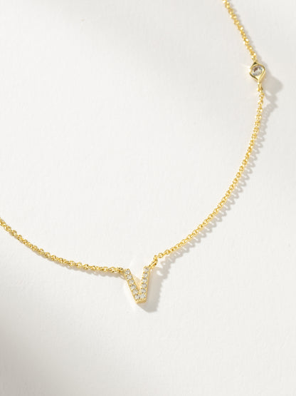 ["Pavé Initial Necklace ", " Gold V ", " Product Detail Image ", " Uncommon James"]