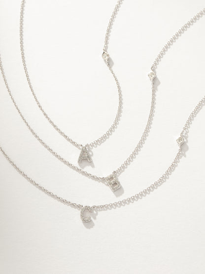 ["Pavé Initial Necklace ", " Sterling Silver ", " Group Image ", " Uncommon James"]