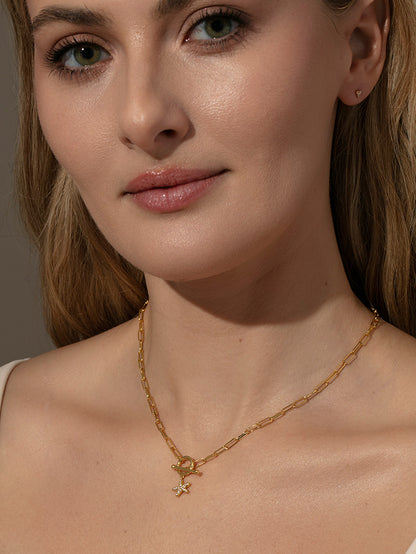 ["Starfish Pendant and Chain Necklace ", " Gold ", " Model Image ", " Uncommon James"]