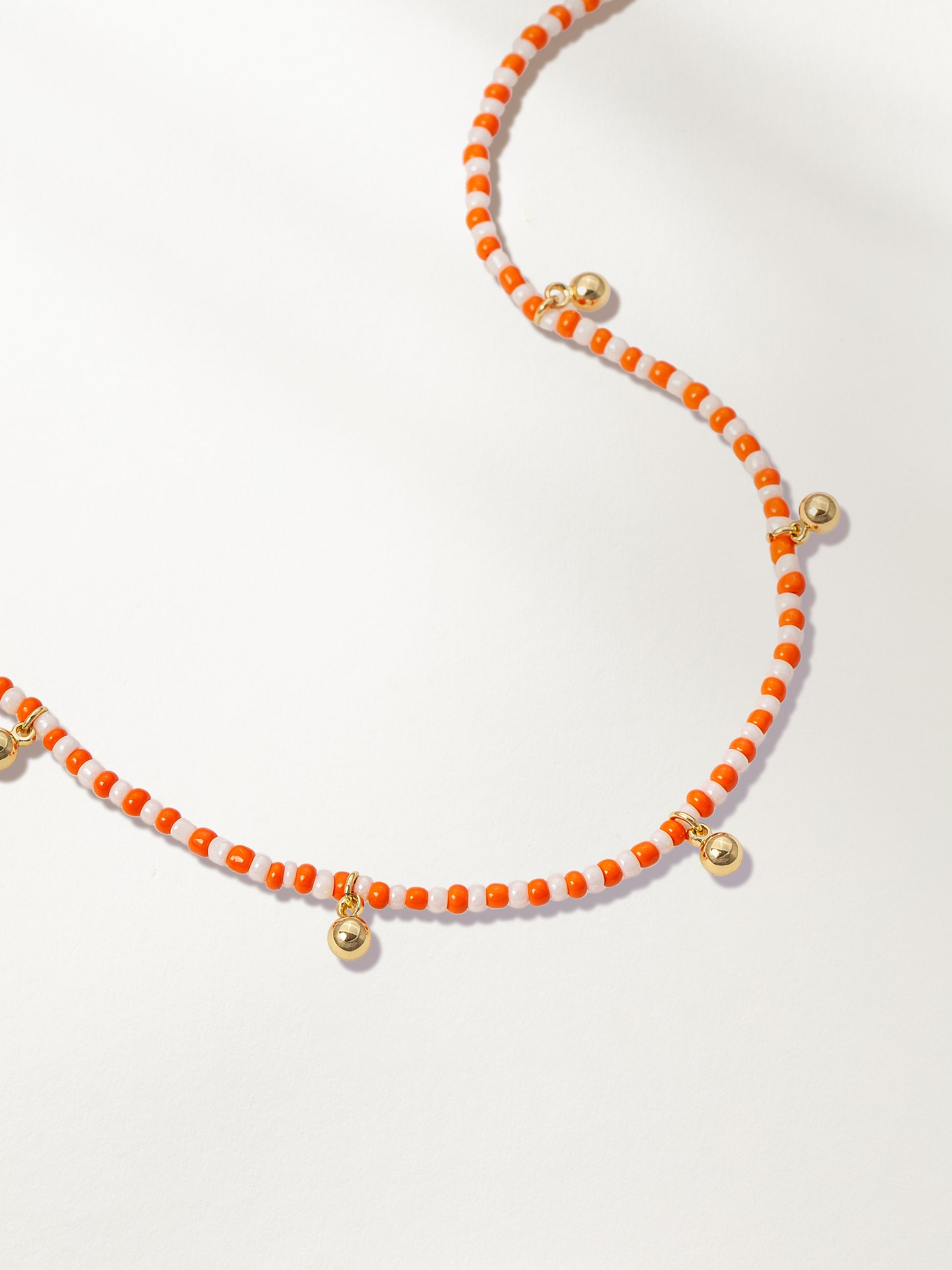 Sunset Beaded Necklace | Gold Orange/White | Product Detail Image | Uncommon James