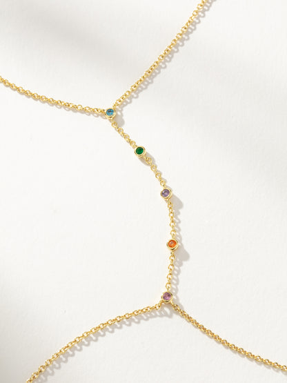 ["Rainbow Gem Body Chain ", " Gold ", " Product Detail Image ", " Uncommon James"]