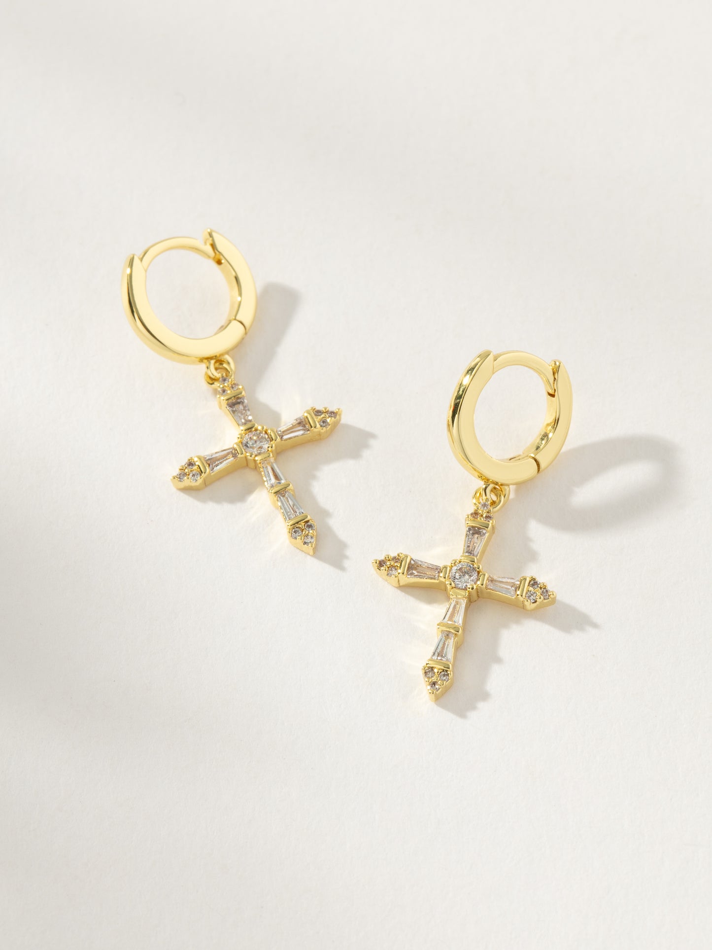 Crystalized Cross Huggie Earrings | Gold | Product Image | Uncommon James