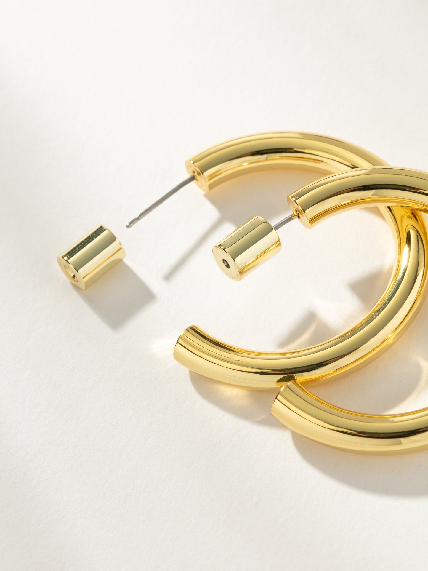 Effortless Tube Hoop Earrings | Gold | Product Detail Image | Uncommon James