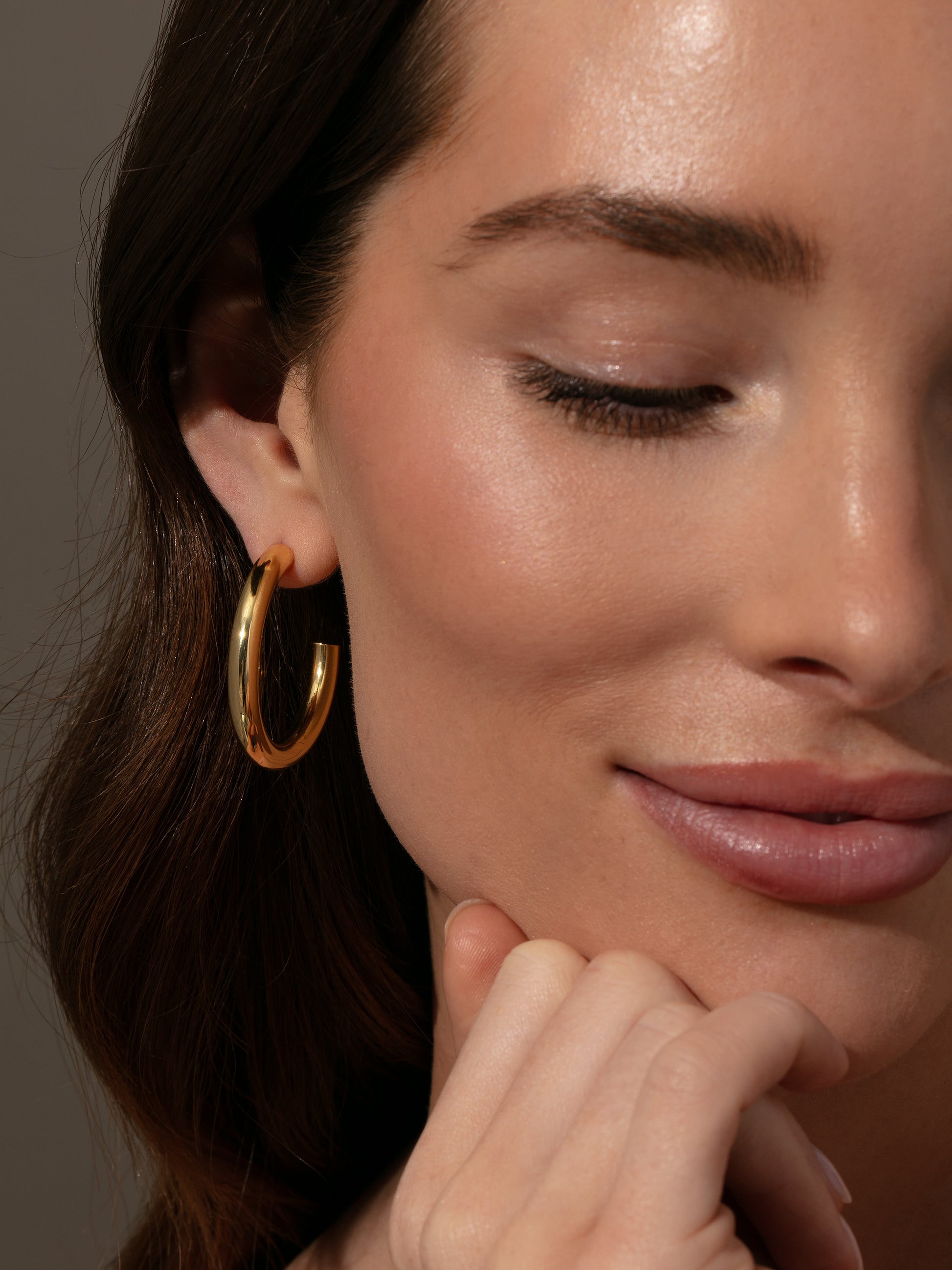 Effortless Tube Hoop Earrings | Gold | Model Image | Uncommon James