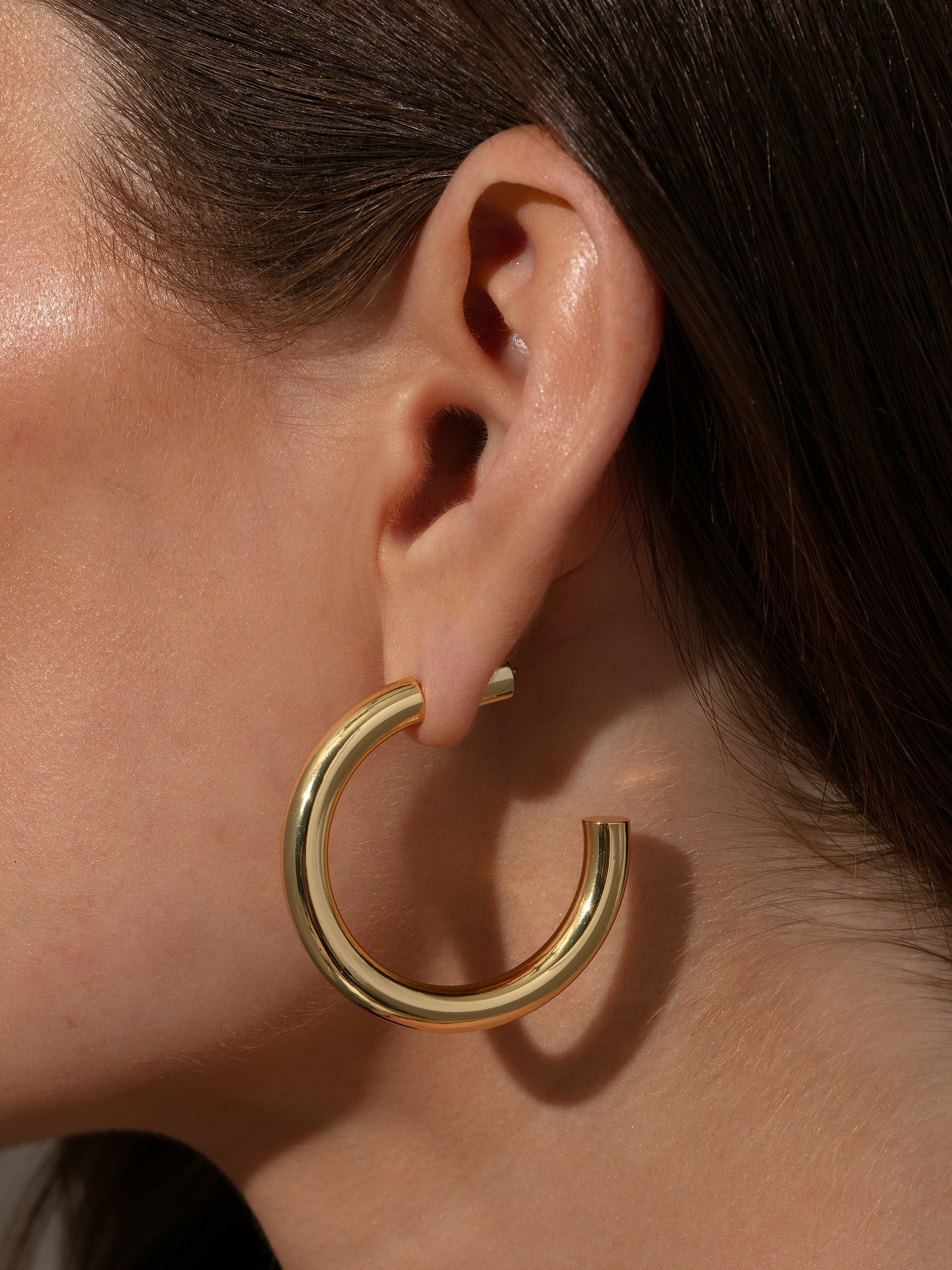 Effortless Tube Hoop Earrings | Gold | Model Image 2 | Uncommon James