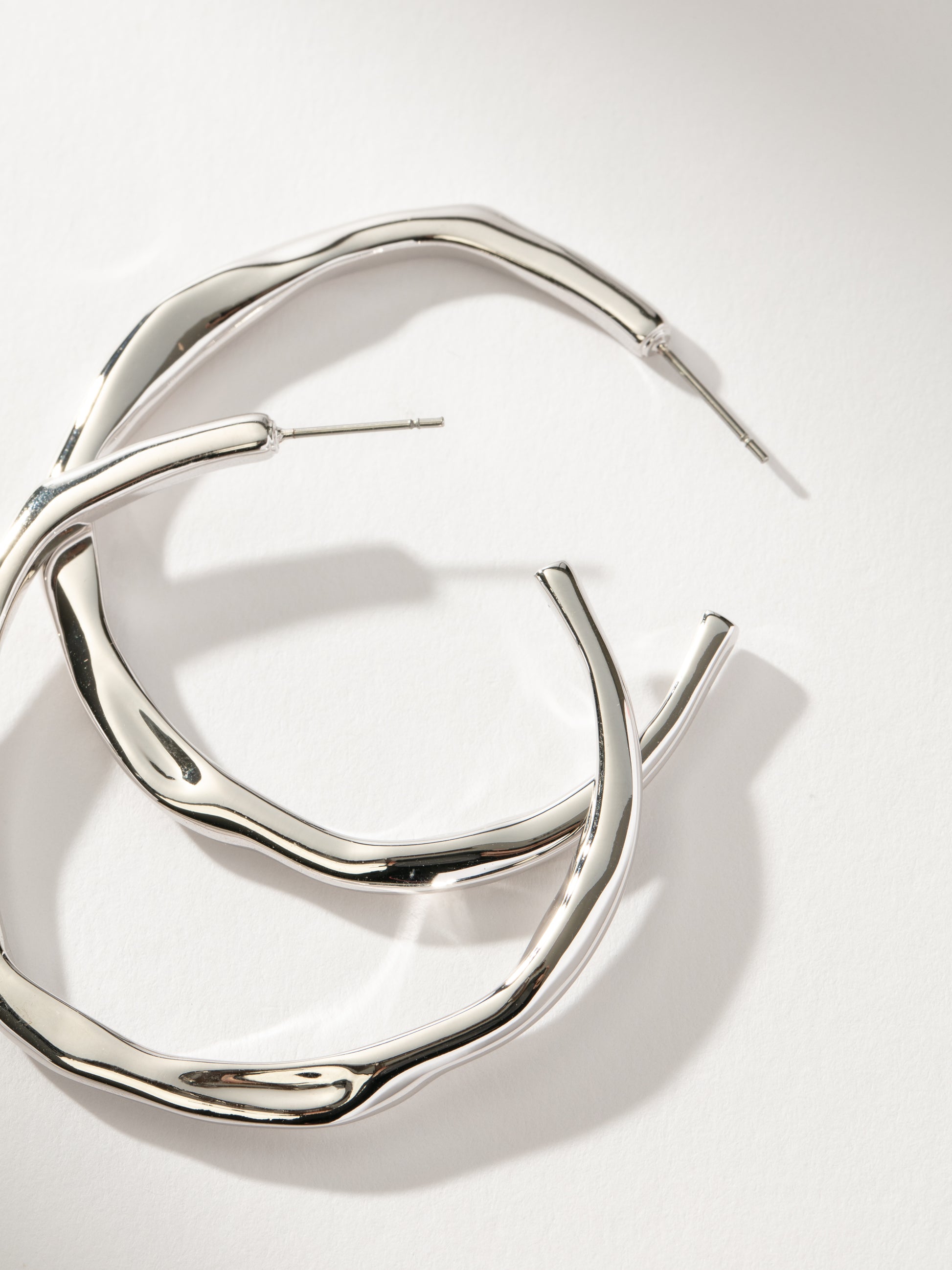 Wavy Hoop Earrings | Silver | Product Detail Image | Uncommon James