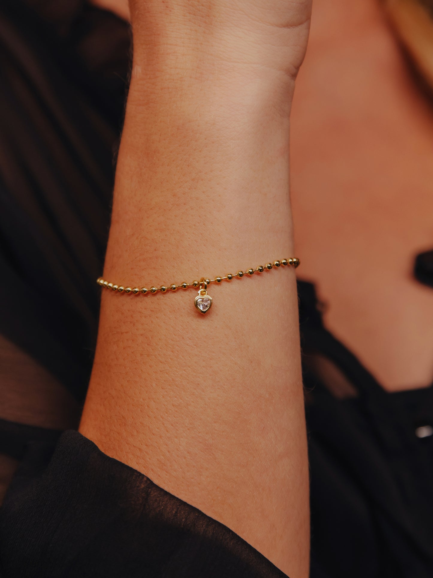 Crystal Heart Bracelet | Gold | Campaign Image | Uncommon James