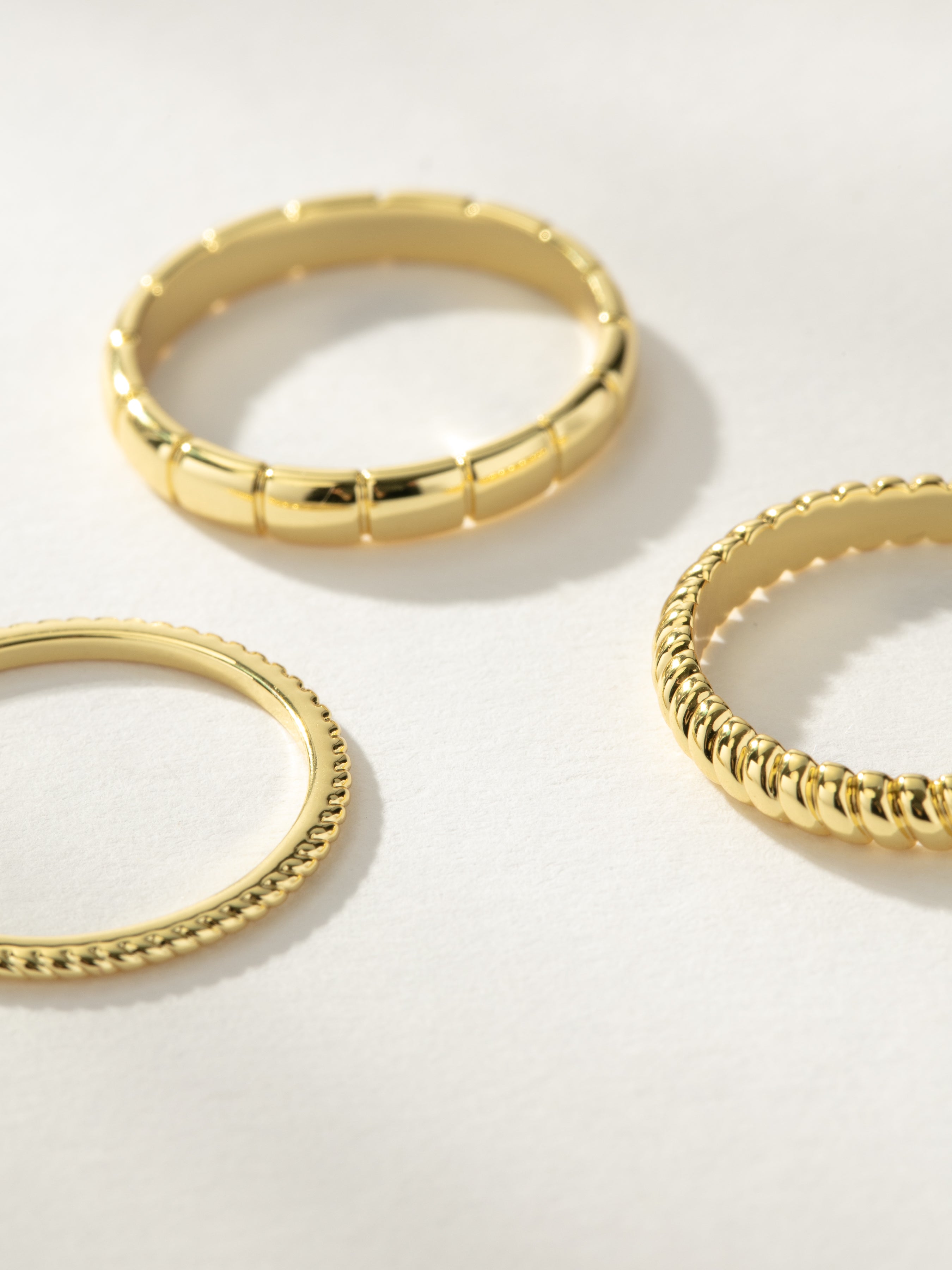 アクセサリー source objects Gold Stacking Rings Vortex Textured Ring Stack Set of 3 in Gold | Uncommon James