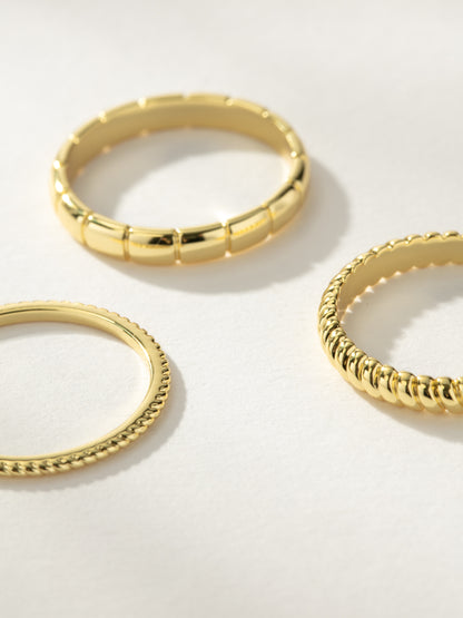 ["Vortex Textured Ring Stack (Set of 3) ", " Gold ", " Product Image ", " Uncommon James"]