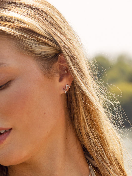 Pavé Wishbone Stud Earrings | Gold | Lifestyle Image | Uncommon James