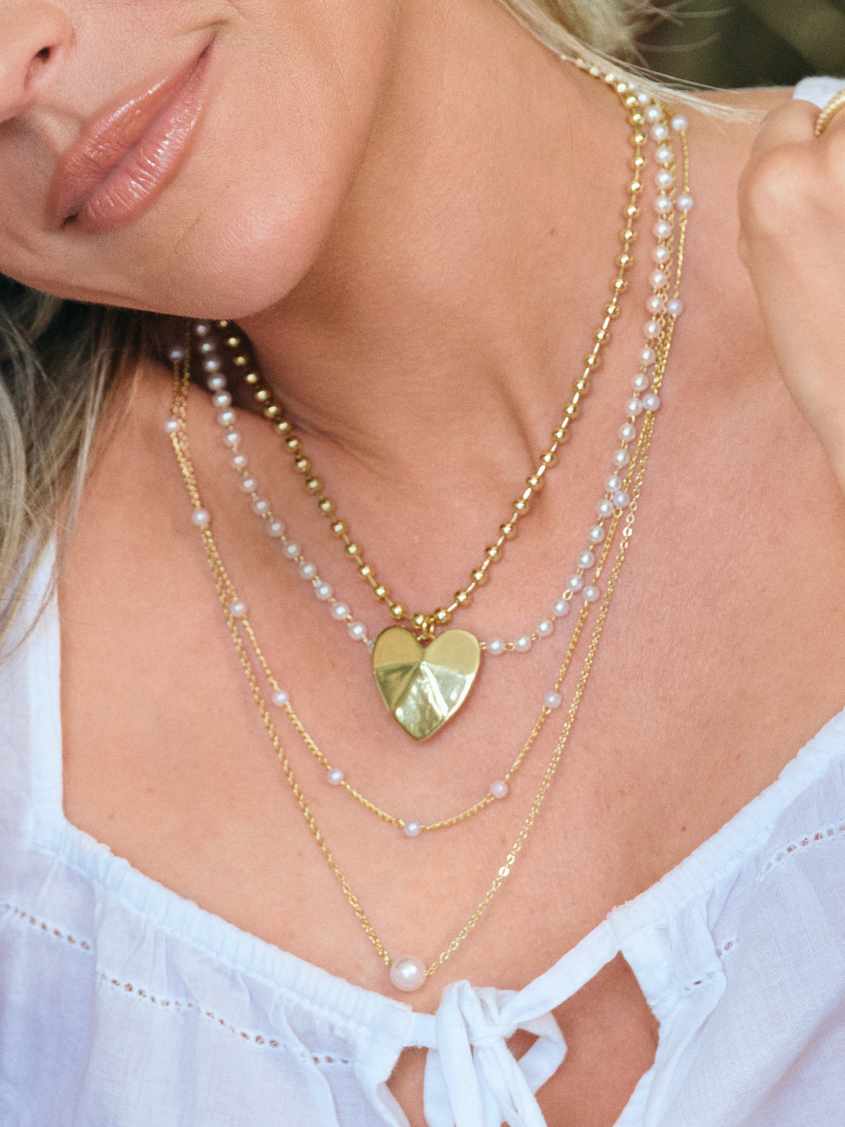 One Gram Gold Triple Layer Pearl Lakshmi Pendant Necklace One Gram Gold Triple Layer Pearl Lakshmi Pendant Necklace