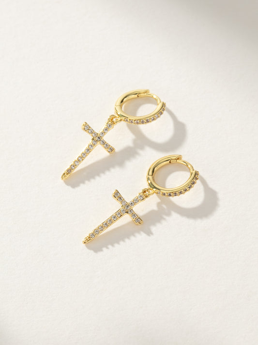 Higher Shine Cross Huggie Earrings | Gold | Product Image | Uncommon James