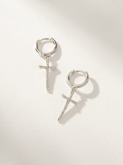 ["Higher Shine Cross Huggie Earrings ", " Silver ", " Product Image ", " Uncommon James"]