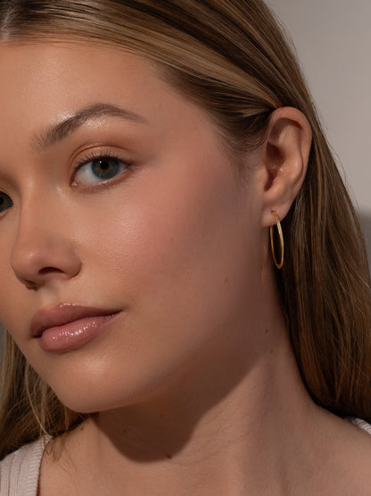 ["On The Edge Hoop Earrings ", " Gold ", " Model Image ", " Uncommon James"]