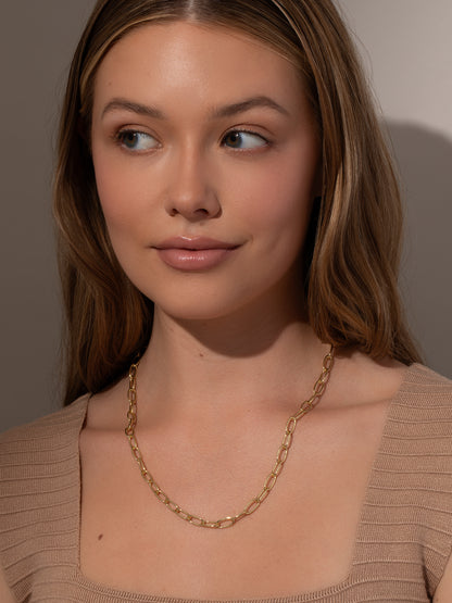 ["Bite Back Chain Necklace ", " Gold ", " Model Image ", " Uncommon James"]