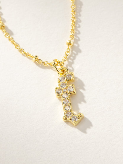 ["Made to Shine Initial Necklace ", " Gold F ", " Product Image ", " Uncommon James"]