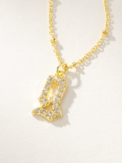 ["Made to Shine Initial Necklace ", " Gold G ", " Product Image ", " Uncommon James"]