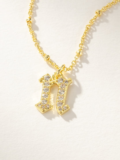 ["Made to Shine Initial Necklace ", " Gold N ", " Product Image ", " Uncommon James"]