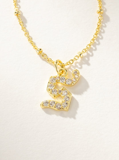 ["Made to Shine Initial Necklace ", " Gold S ", " Product Image ", " Uncommon James"]