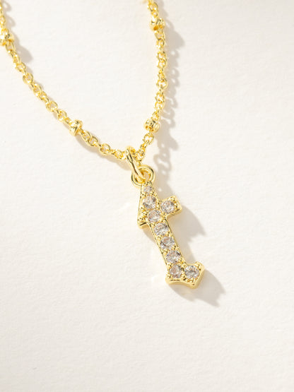 ["Made to Shine Initial Necklace ", " Gold T ", " Product Image ", " Uncommon James"]